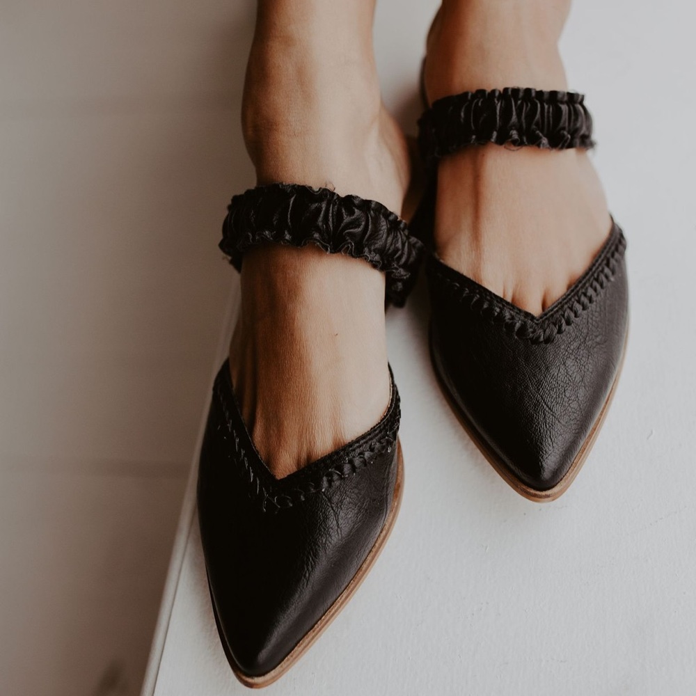 Black leather flats